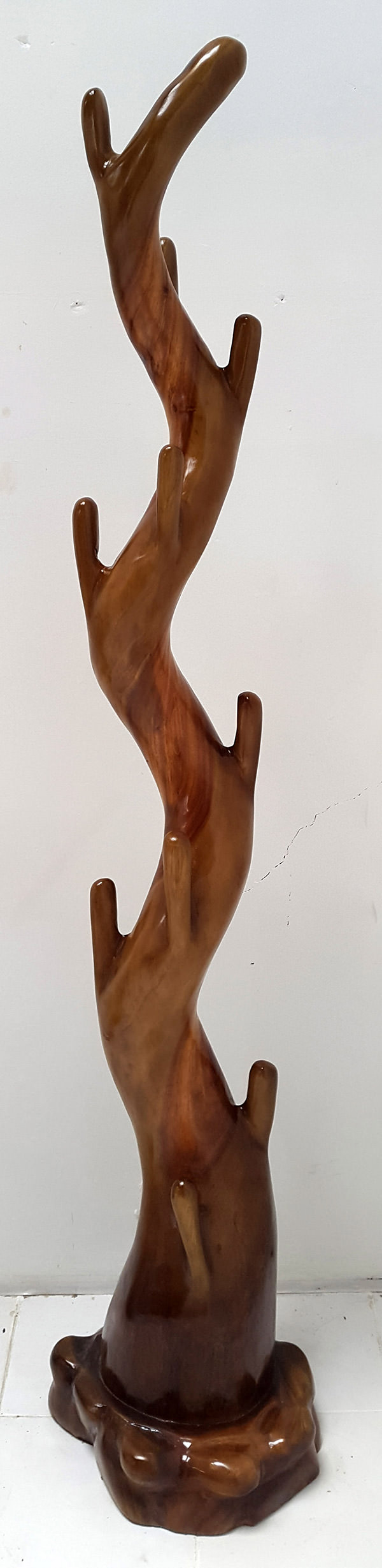 suar coat hanger with brown stain