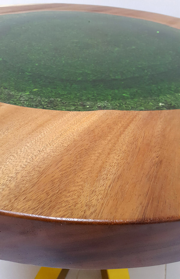 detail of teak and resin coffee table table top