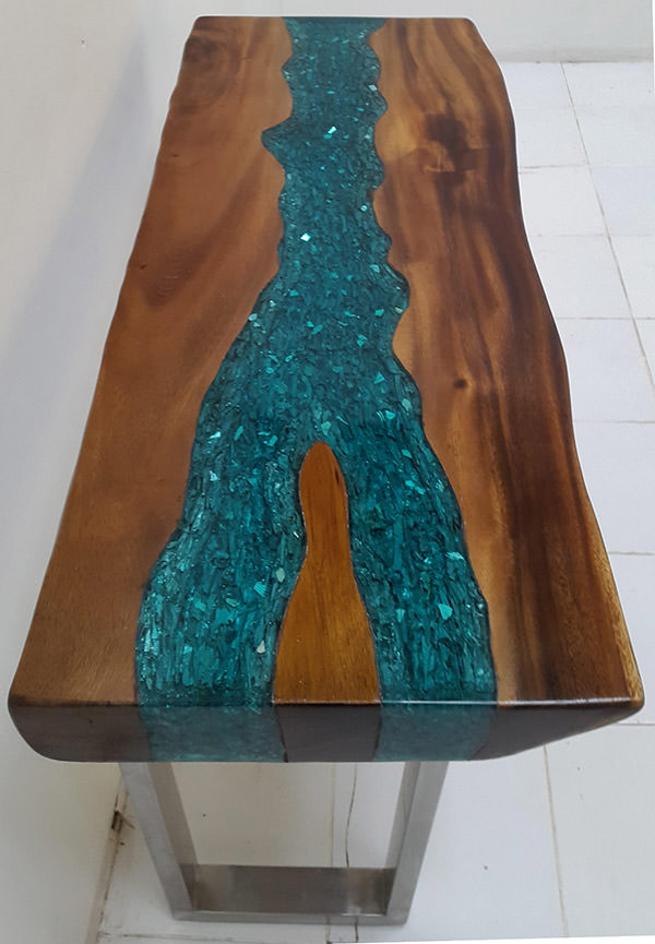 suar table with blue resin on the table top
