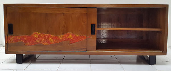 teak cabinet with red and orange resin