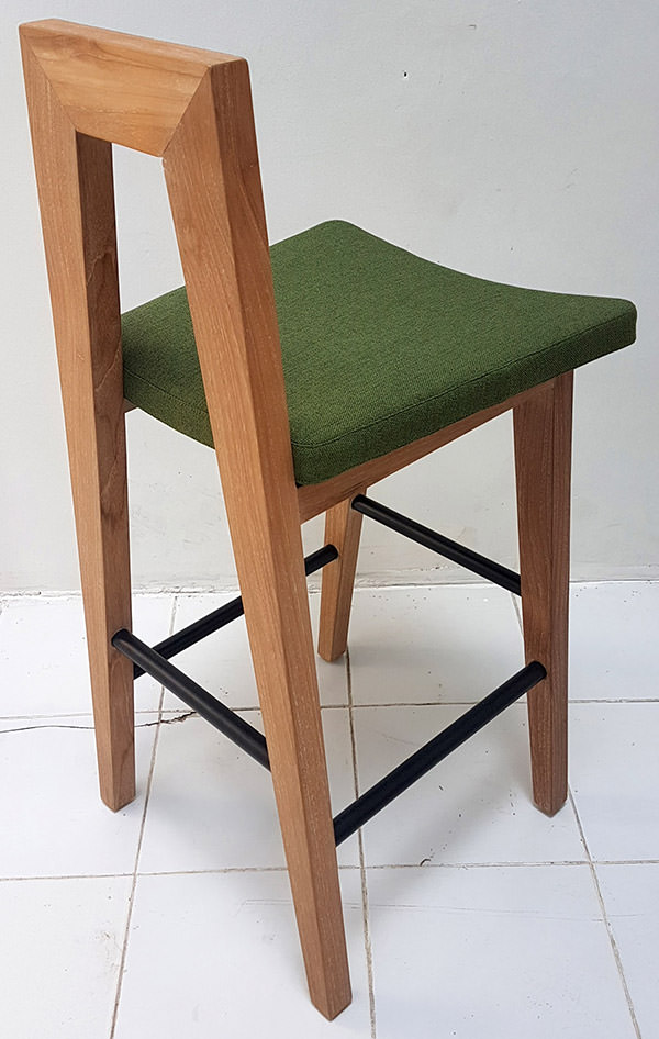 teak bar stool with plain linen seat and iron feet bar