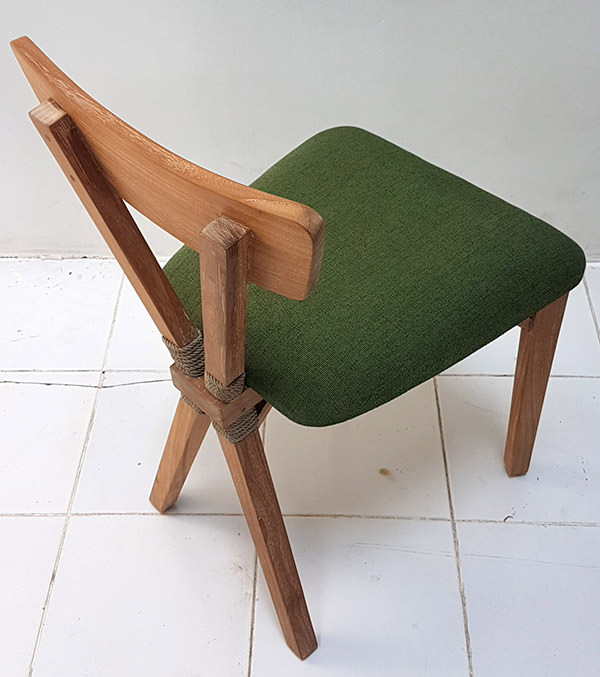 mid-century teak dining chair with green linen seat
