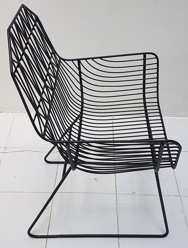 outdoor black iron armchair with geometric pattern