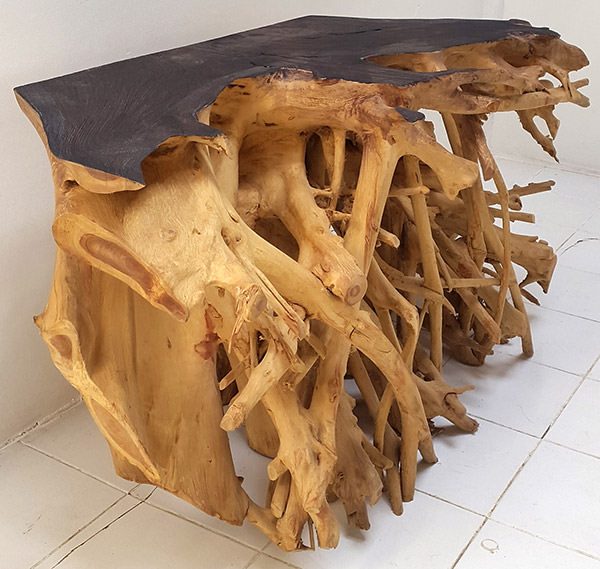 teak root furniture with sugi ban charcoal top burnt with flames