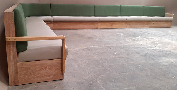 teak, leather and linen restaurant banquette from Java