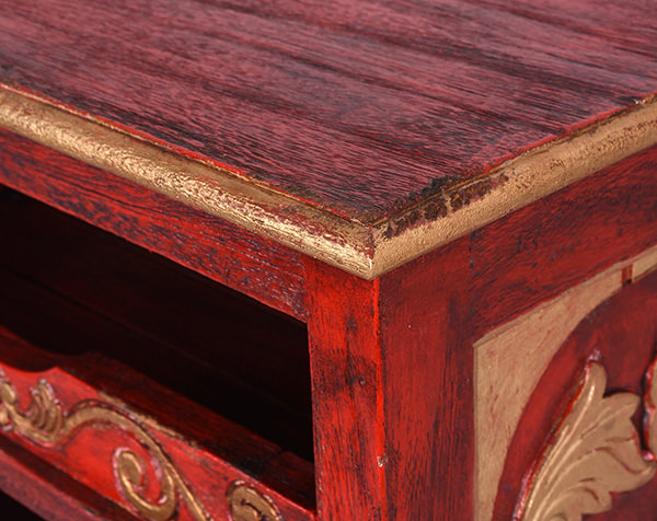red painted vintage furniture with pattern and distressed gold edges