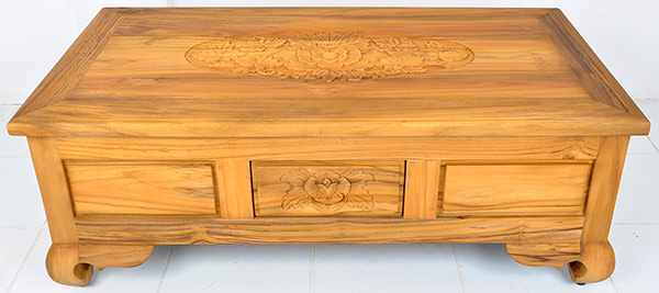 wooden coffee table with handmade carved details