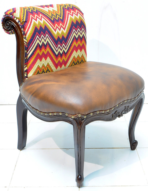 Peruvian fabric and brown leather seat