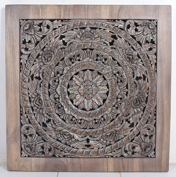 wooden wall panel with handmade carvings