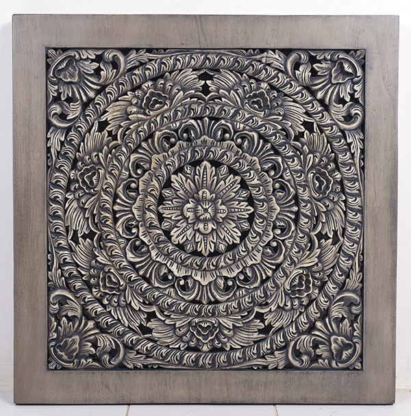 wooden wall panel with handmade floral carvings