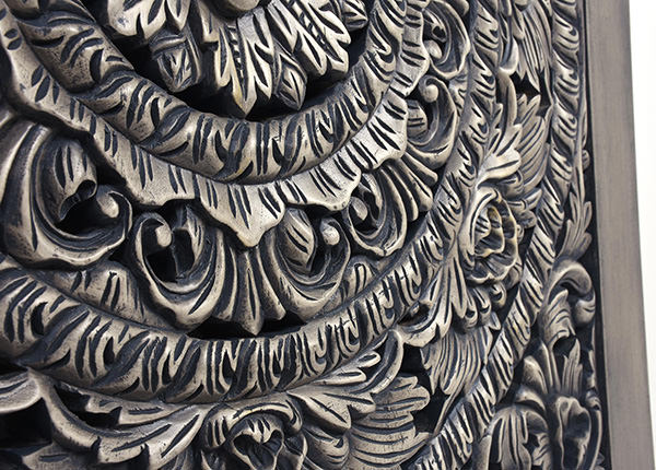 hand made ethnic wood carving details with reclaimed wood finish