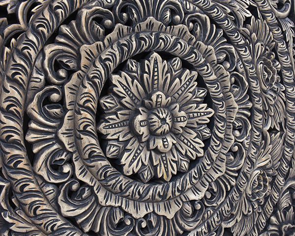 hand made ethnic traditional flower wood carving details with reclaimed wood finish