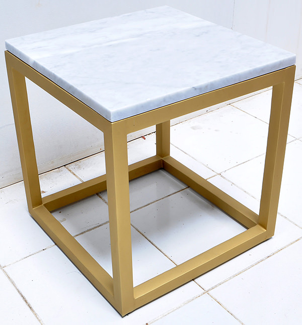 white marble and brass