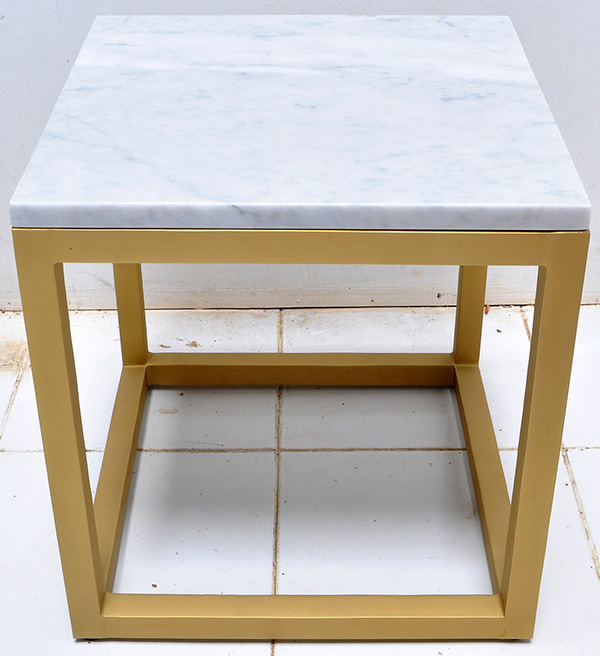 White marble and golden brass table