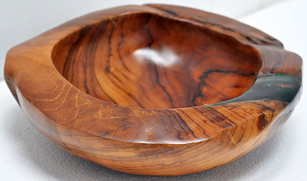teak and resin fruit bowl with a natural finish