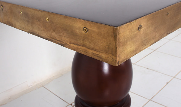 Glossy square teak table with vintage brass edge