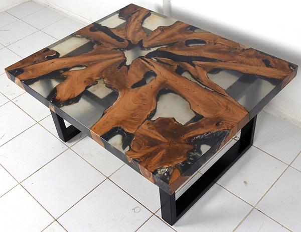 wood and clear resin furniture with iron legs