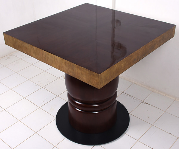 mahogany table leg with golden brass edges