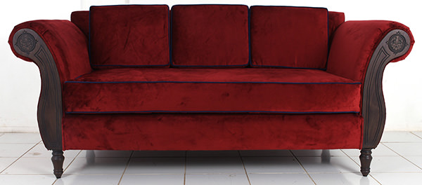 teak and velvet red couch