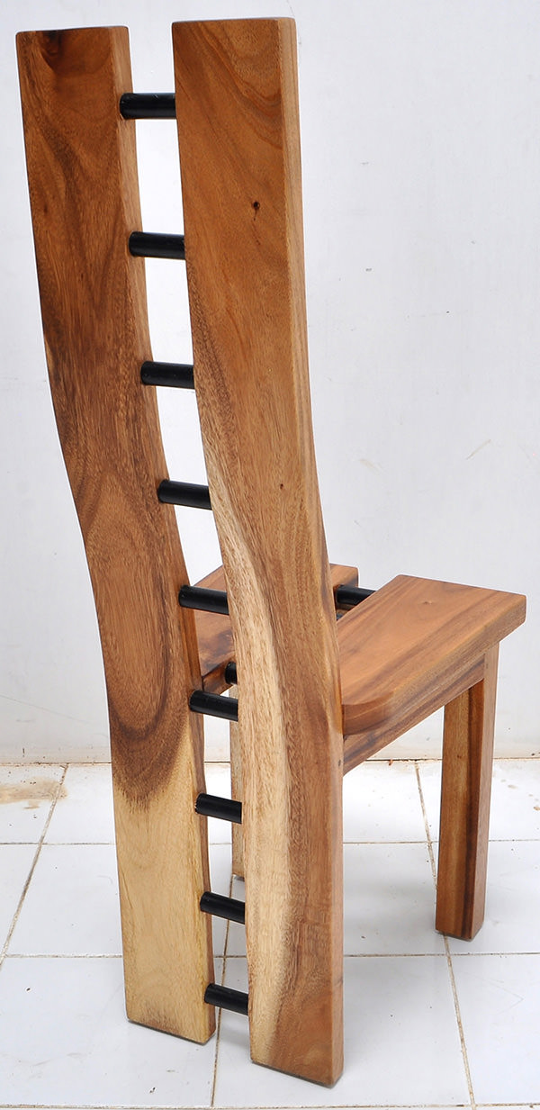 monkeypod dining chair with natural wood finish and black iron connectors