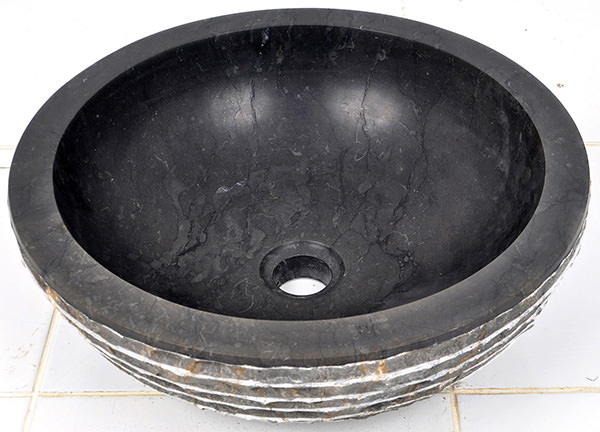 black polished river stone sink