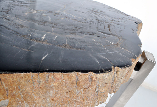 natural fossil side table top with crossed stainless steel legs