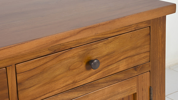 wooden cabinetry with brass handle knop