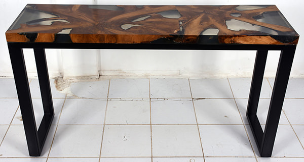 smooth resin and teak table
