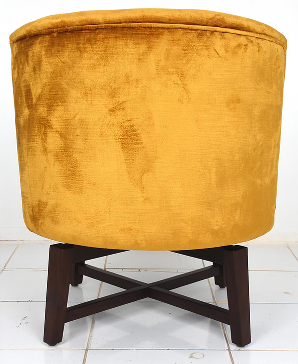 Brown teak and golden velvet restaurant lounge chair with X-shaped legs and swivel