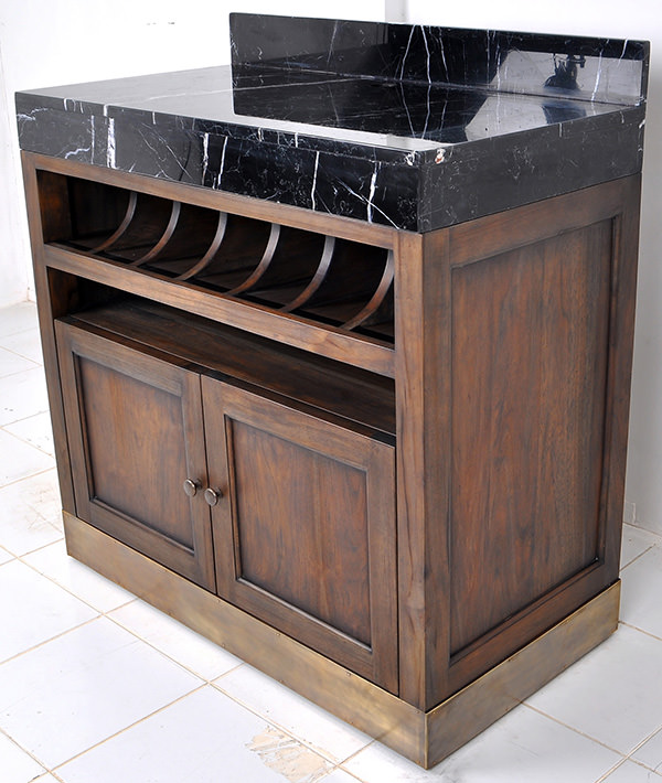 brown teak serving station with black marble top and golden brass feet