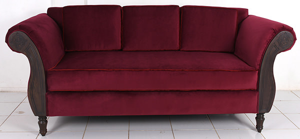 teak and velvet red restaurant couch