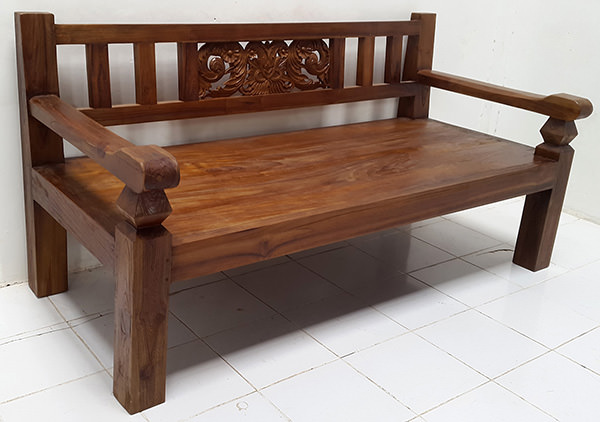 traditional teak bench with carvings