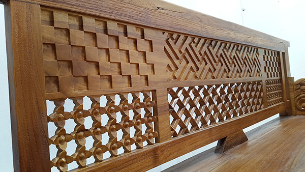 teak furniture with geometric carvings