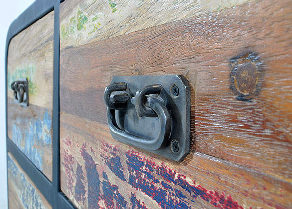 detail of a indonesian boatwood teak cabinet with a black iron frame