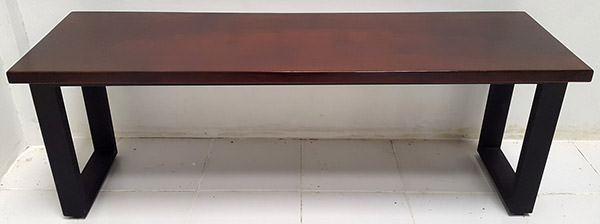 walnut color console table with black iron legs