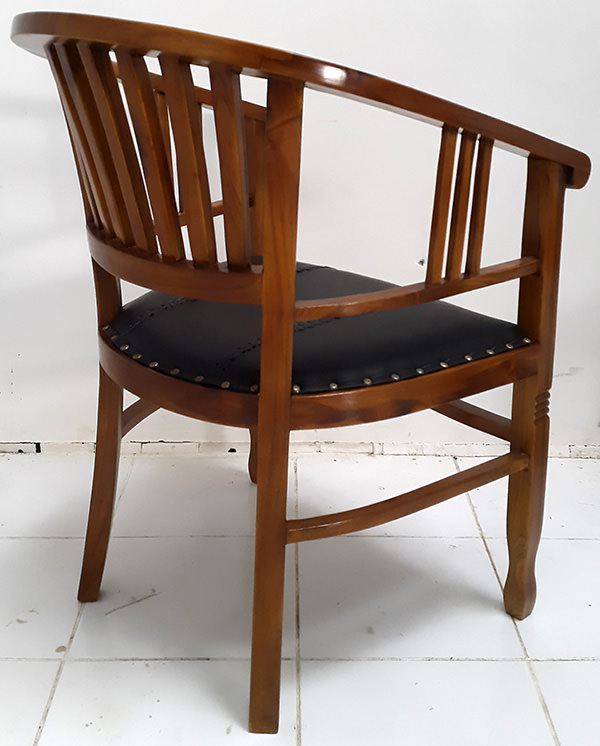 brown teak and leather armchair with a semi-gloss finish