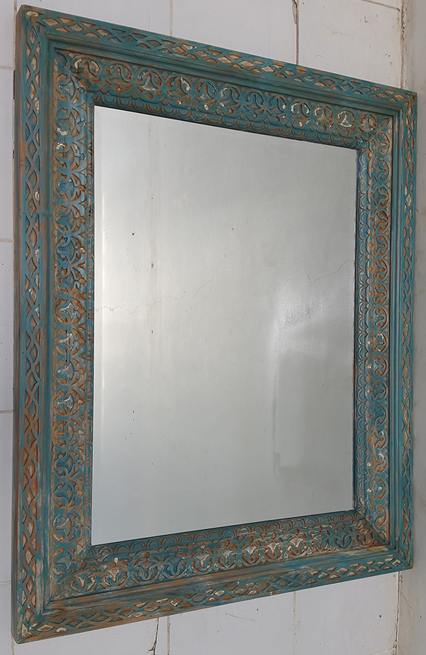 distressed vintage mirror with blue paint