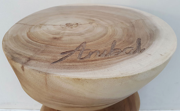 suar stool with natural finishing and carved name