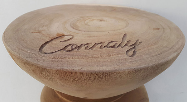 suar stool with natural finishing and carved name on top