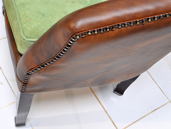 vintage leather restaurant seat with velvet cushion