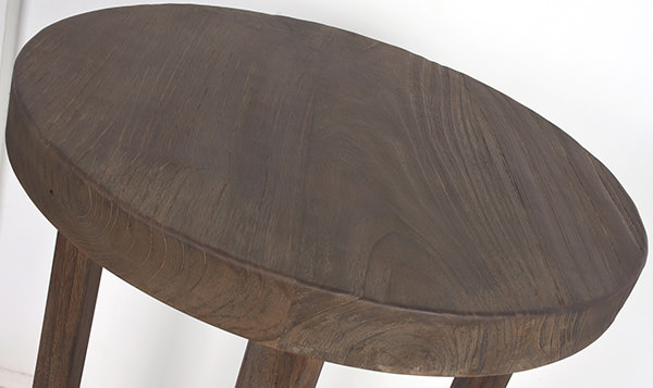 dining table with X-shaped legs with dark wooden grain