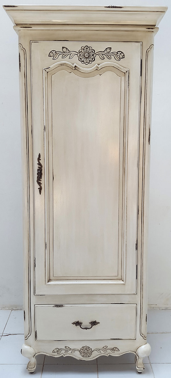 white wardrobe with carved ornements