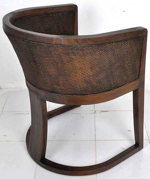 indoor brown rattan and leather chair