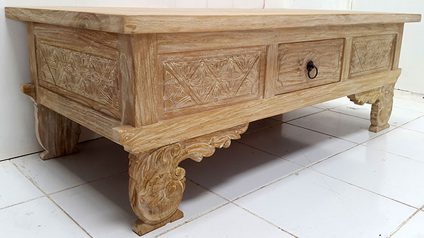 carved traditional teak table