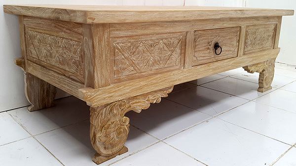 carved traditional teak table