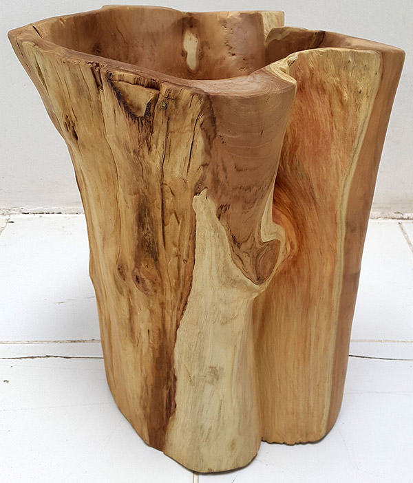 solid wood pot with organic shapes and natural finish