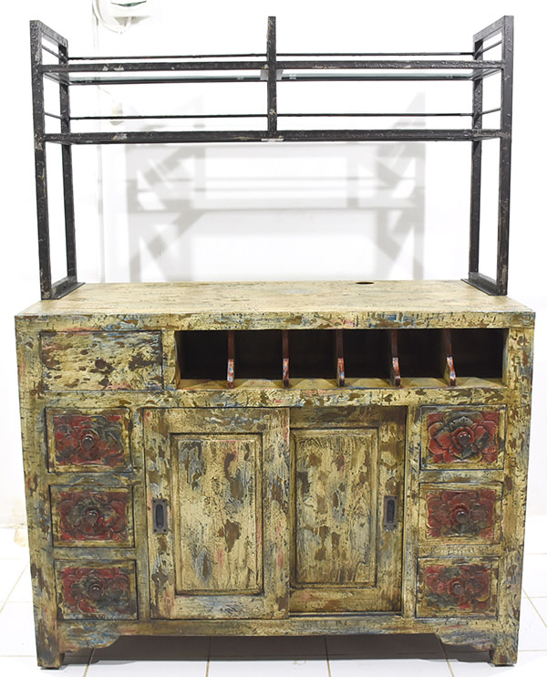 antique wooden cabinet with iron rack