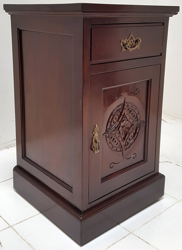 teak side table with one drawer and one carved door