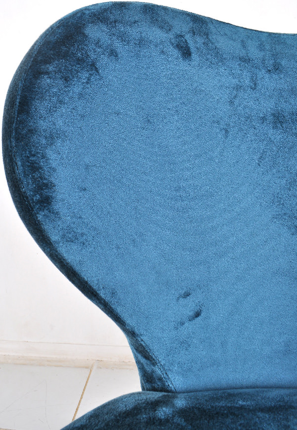 blue velvet restaurant chair with curved backseat