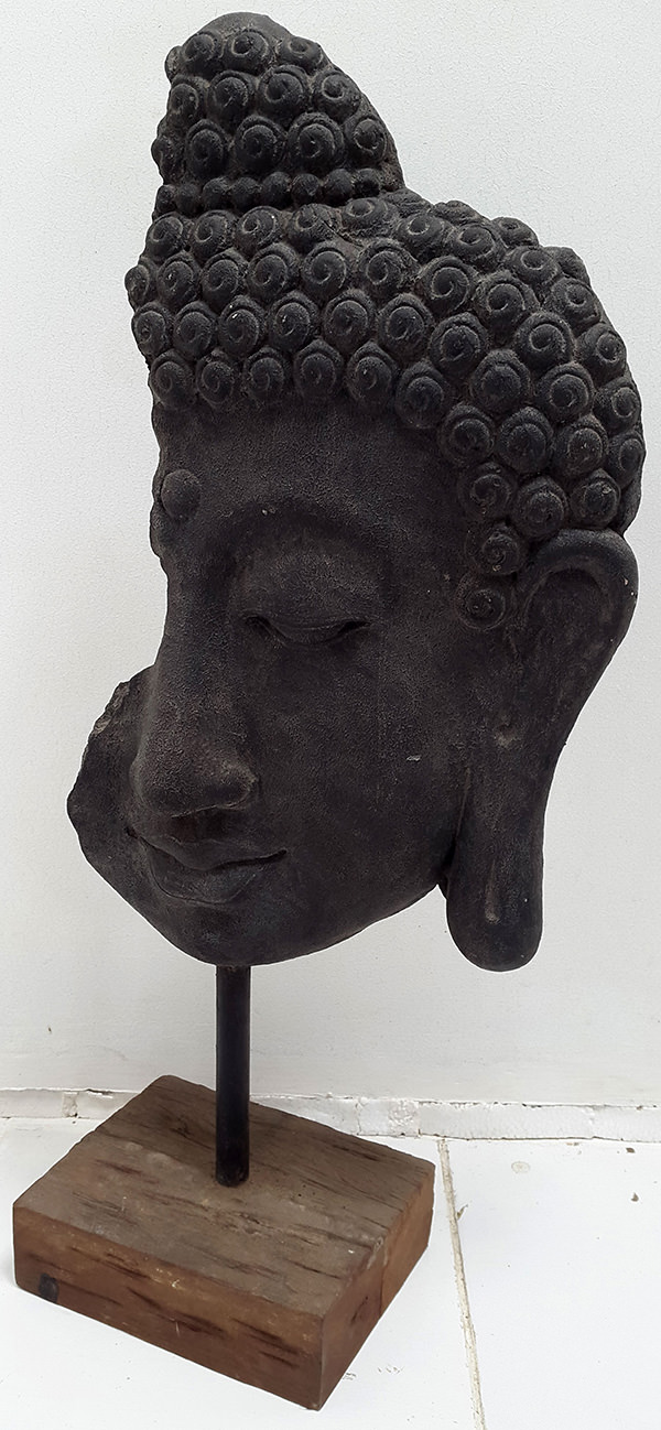 black stone sculpture face